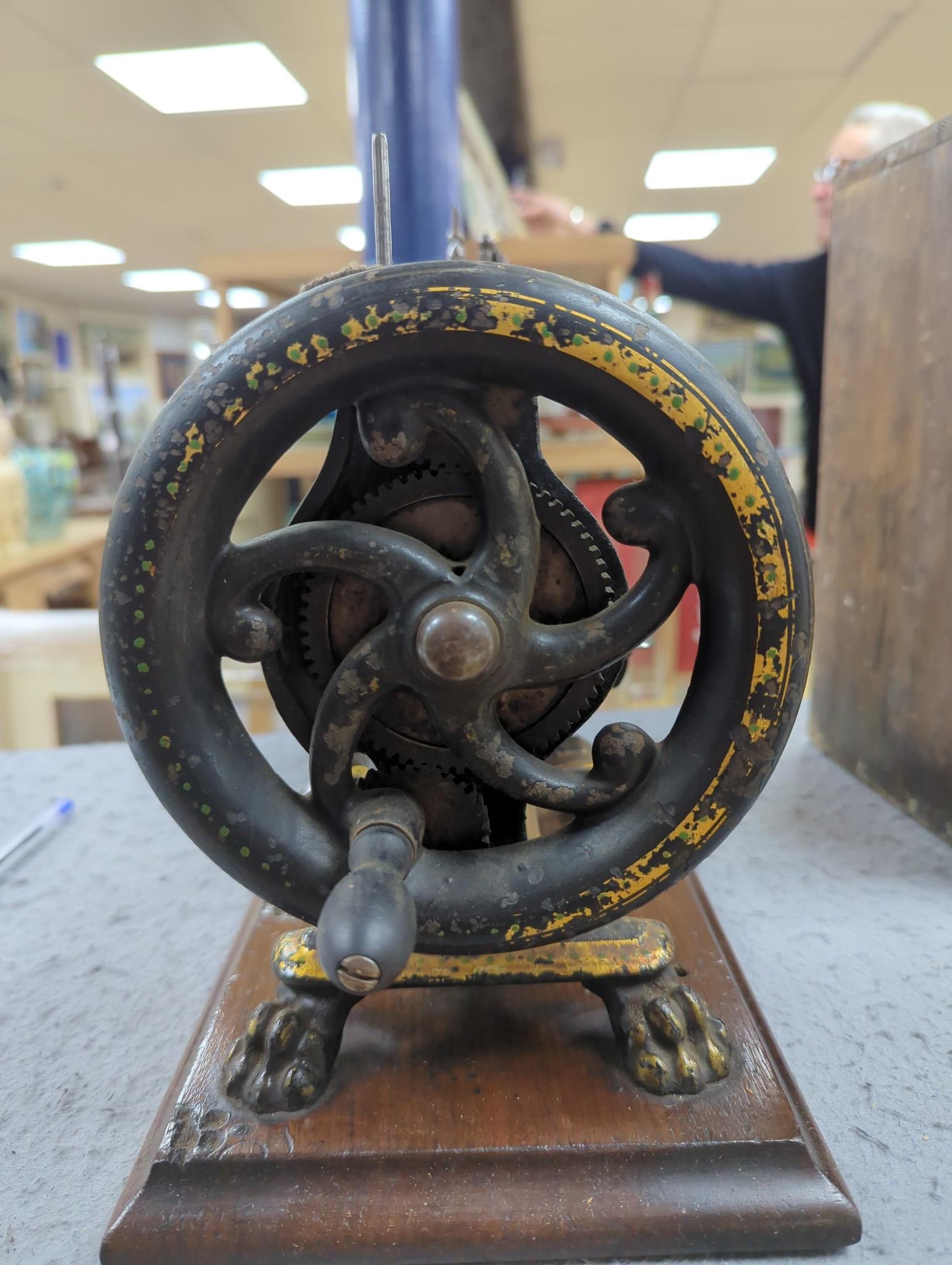 A Smith & Co. The Monarch sewing machine with original case and manual